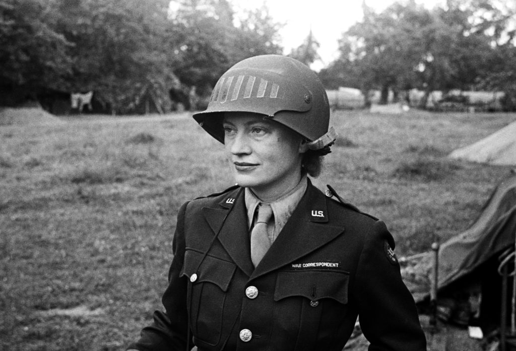 Lee Miller in steel helmet specially designed for using a camera, Normandy, Unknown Photographer, 1944